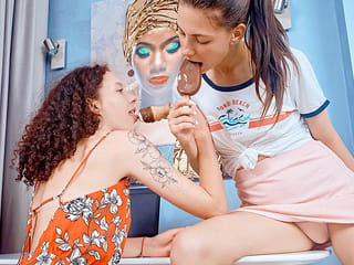 Lesbians share ice-cream and dildo