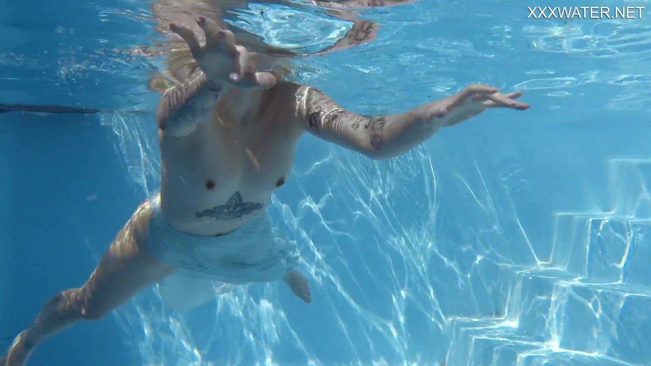 Naked Finnish blonde tattooed mermaid Mimi underwater