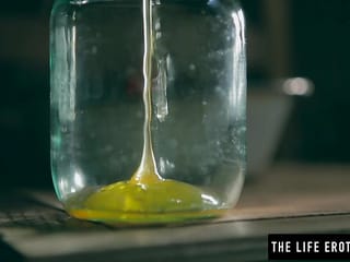 Naughty Raeah uses honey and cucumber to masturbate solo