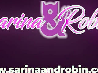 SARINAANDROBIN Corseted Woman Gives Gloved Anal and Handjob on Purple Lit Couch