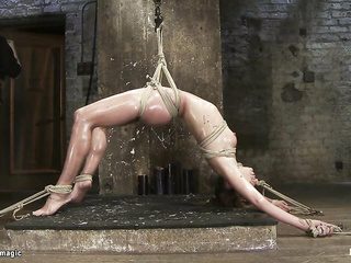 Slave in back arch bondage candle waxed